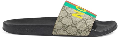 not fake gucci|Gucci Women's 'Fake/Not' print slide sandal.